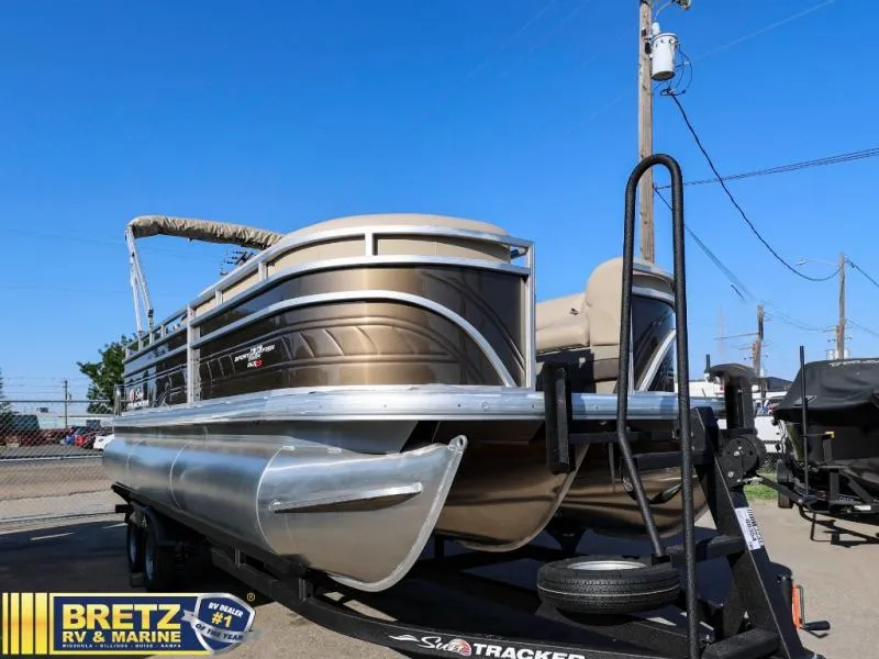 Slide: The Image of 2024 Sportfish 22 XP3 pontoon boat on trailer at Bretz RV & Marine dealership. - 6