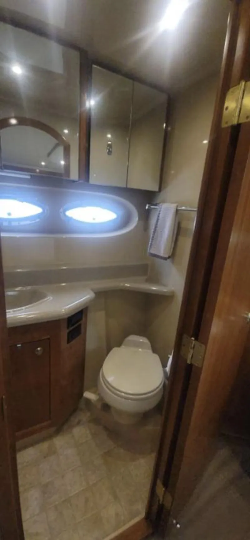 Slide: The Image of Luxurious bathroom in 2005 Cruisers Yachts 405 Express Motoryacht with modern fixtures. - 17
