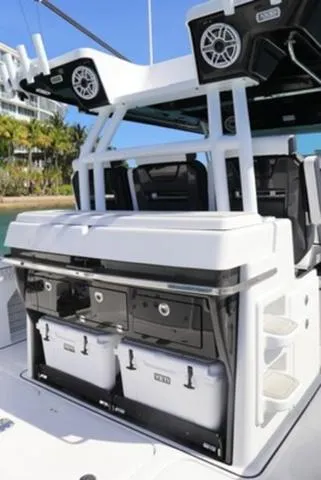 Slide: The Image of 2024 Blackfin 400CC boat with modern seating and storage features. - 11