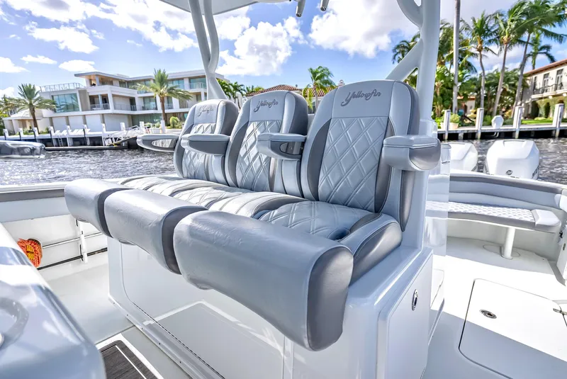 Slide: The Image of Luxurious seating on a 2021 Yellowfin 39 boat, featuring elegant gray upholstery. - 28