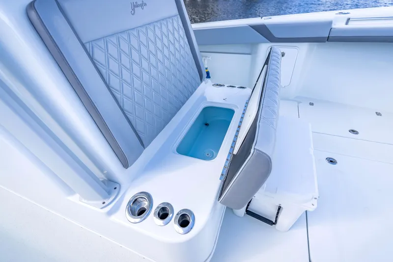 Slide: The Image of 2021 Yellowfin 39 boat interior with seating and storage compartments. - 31