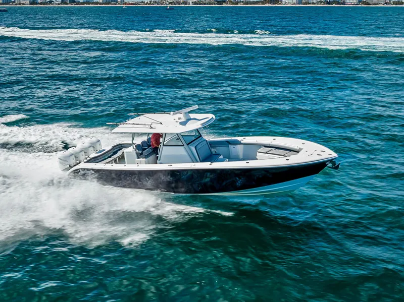 Slide: The Image of 2021 Yellowfin 39 boat cruising on open water. - 8