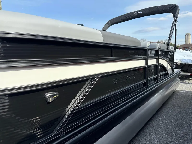 Slide: The Image of 2024 Bennington 20 SSR Quad Bench pontoon boat in stock, side view. - 14