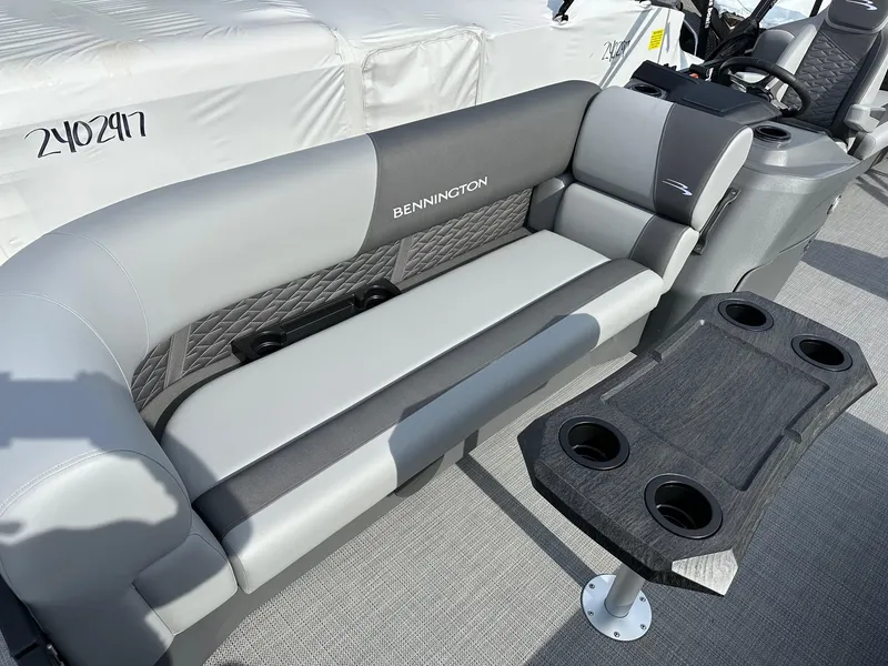 Slide: The Image of 2024 Bennington 20 SSR Quad Bench with table and cup holders. - 16