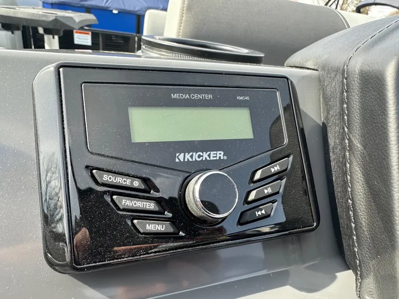 Slide: The Image of Kicker media center in 2024 Bennington 20 SSR Quad Bench boat. - 21