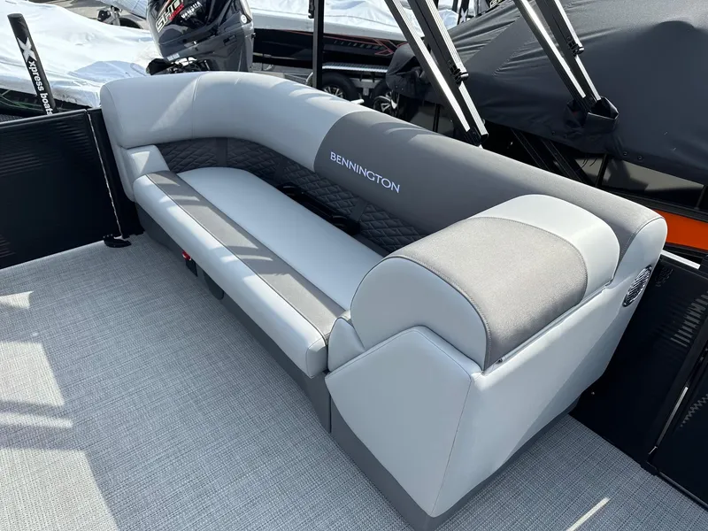 Slide: The Image of 2024 Bennington 20 SSR Quad Bench, luxurious seating on pontoon boat. - 25