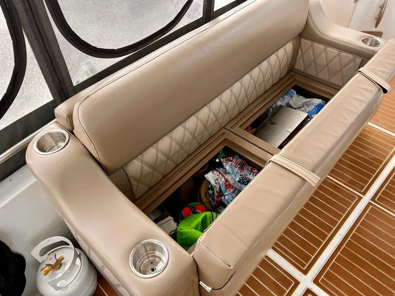 Slide: The Image of Storage compartment under seating on 2000 Carver 396 Motor Yacht. - 12
