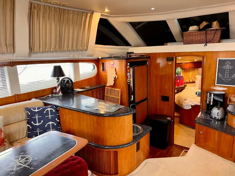 Slide: The Image of Interior of 2000 Carver 396 Motor Yacht with modern amenities and nautical decor. - 19