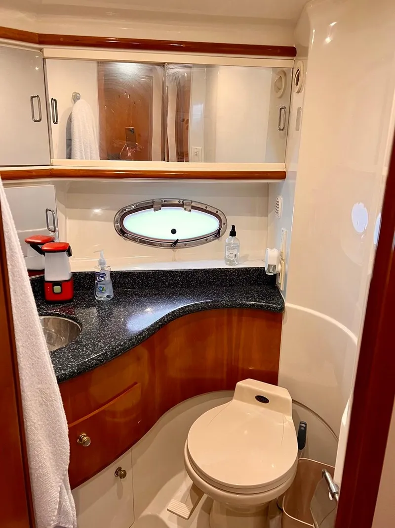 Slide: The Image of 2000 Carver 396 Motor Yacht bathroom with modern amenities and sleek design. - 23