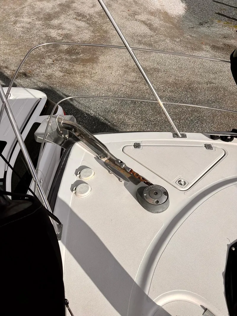 Slide: The Image of Bow deck of a 2000 Carver 396 Motor Yacht with anchor and winch. - 6