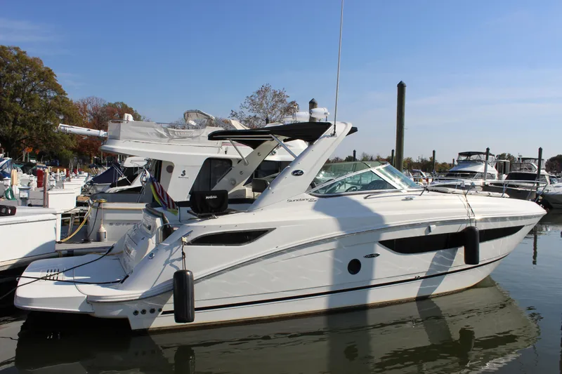 Slide: The Image of 2014 Sea Ray 350 Sundancer yacht docked at marina on a sunny day. - 10