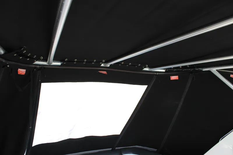 Slide: The Image of Interior view of 2014 Sea Ray 350 Sundancer boat canopy and frame. - 37
