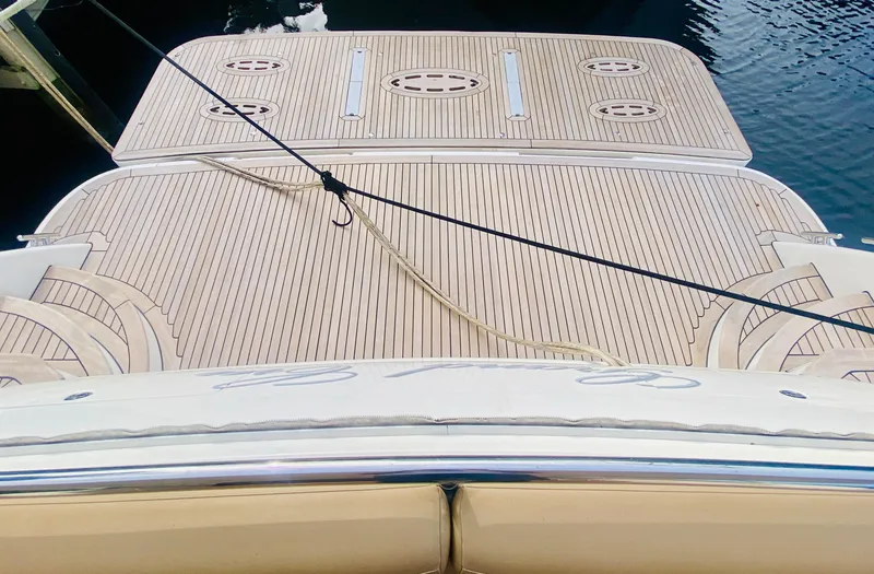 Slide: The Image of 2006 Viking Sport Cruisers 70 Motor Yacht teak swim platform. - 26