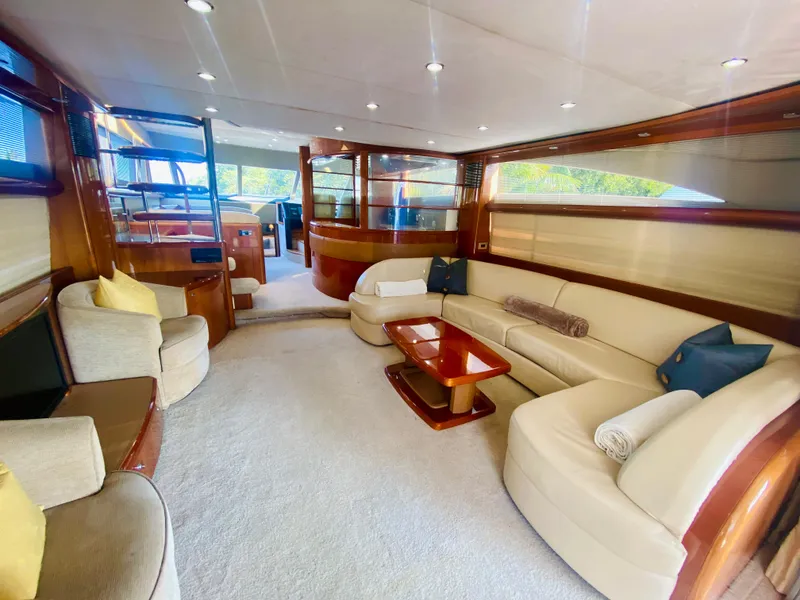 Slide: The Image of Luxurious interior of a 2006 Viking Sport Cruisers 70 Motor Yacht with plush seating and elegant design. - 29