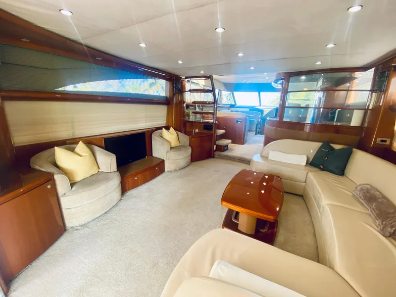 Slide: The Image of Luxurious interior of a 2006 Viking Sport Cruisers 70 Motor Yacht with plush seating and modern decor. - 30