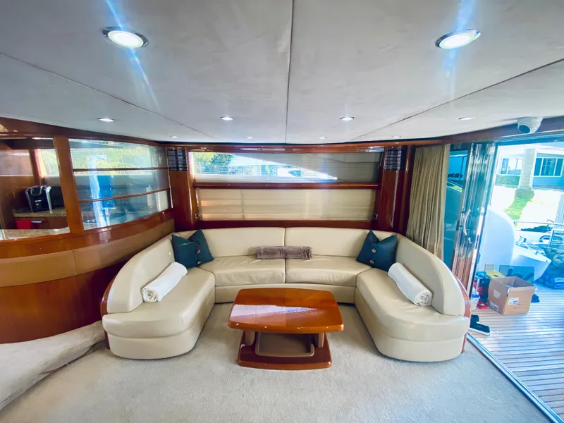 Slide: The Image of Luxurious interior of 2006 Viking Sport Cruisers 70 Motor Yacht with plush seating. - 31