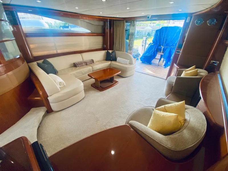 Slide: The Image of Luxurious interior of 2006 Viking Sport Cruisers 70 Motor Yacht with plush seating and elegant decor. - 34