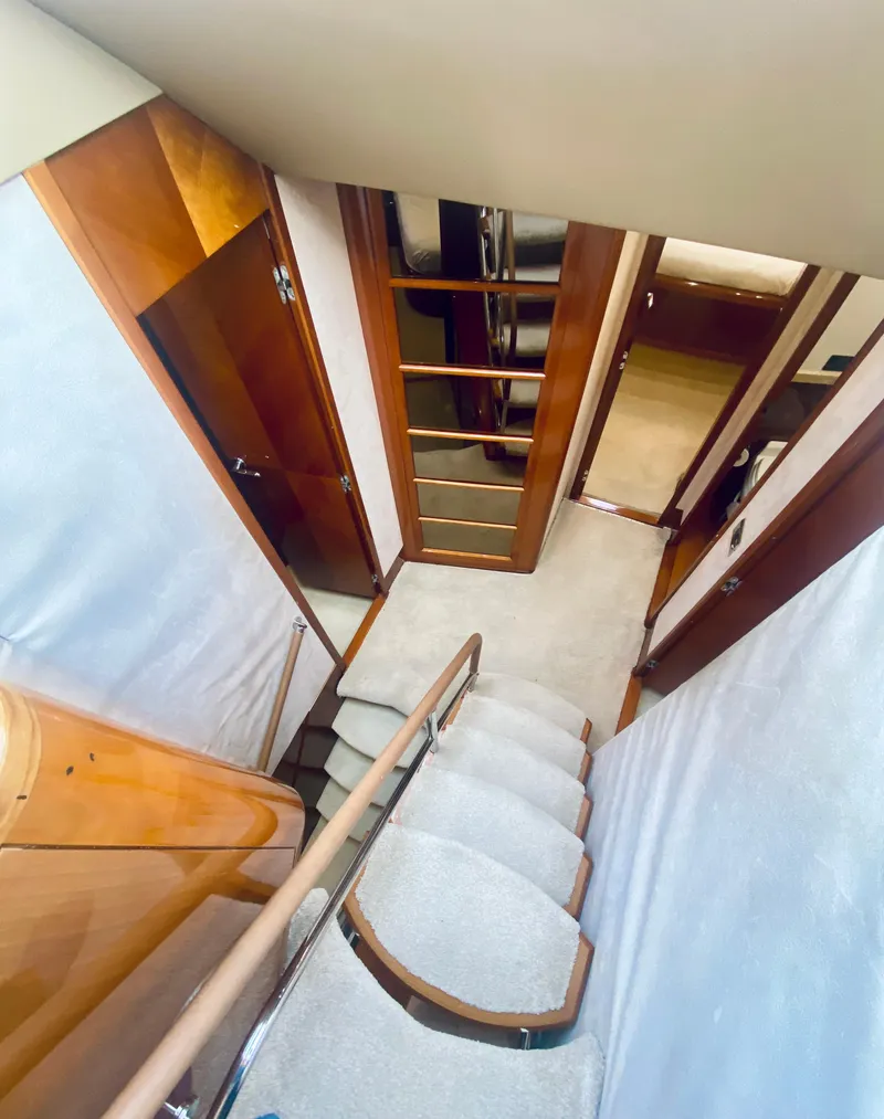 Slide: The Image of Interior stairway of 2006 Viking Sport Cruisers 70 Motor Yacht. - 48
