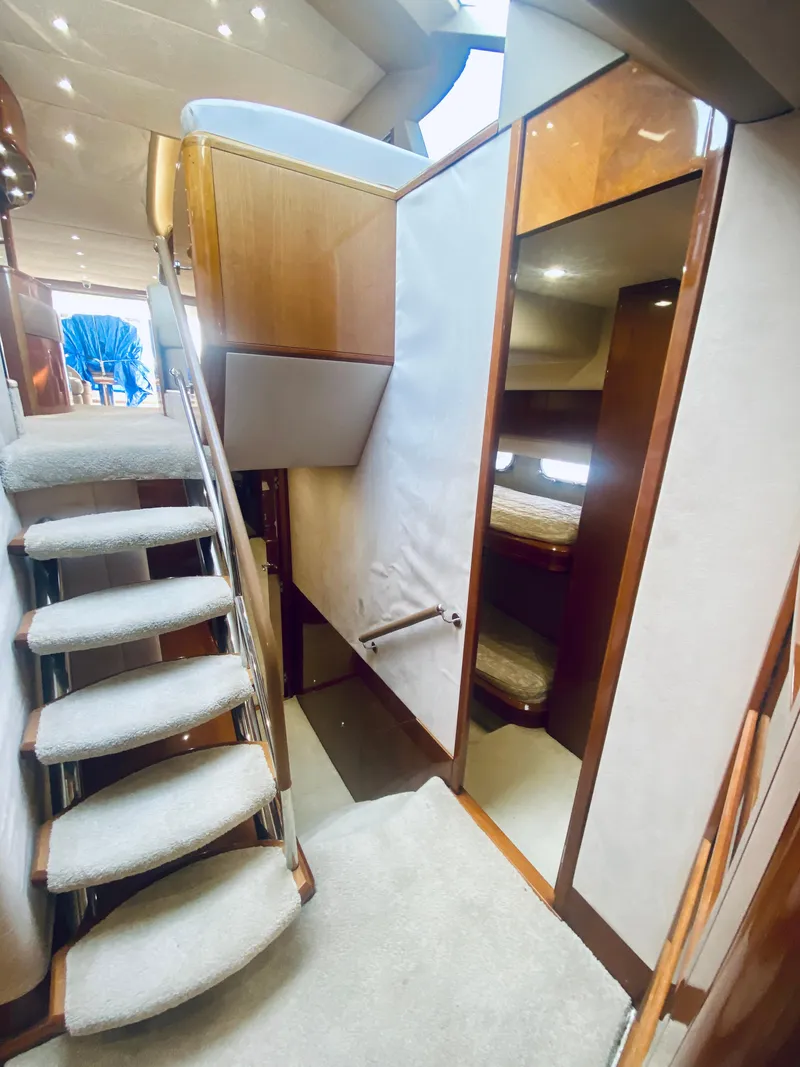 Slide: The Image of Interior of 2006 Viking Sport Cruisers 70 Motor Yacht with stairs and cabin view. - 49