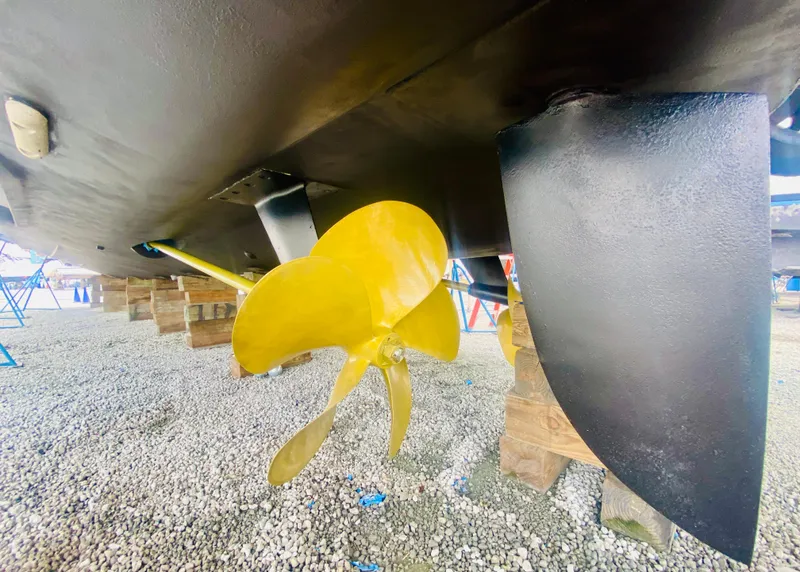 Slide: The Image of Close-up of 2006 Viking Sport Cruisers 70 Motor Yacht propeller and rudder. - 7