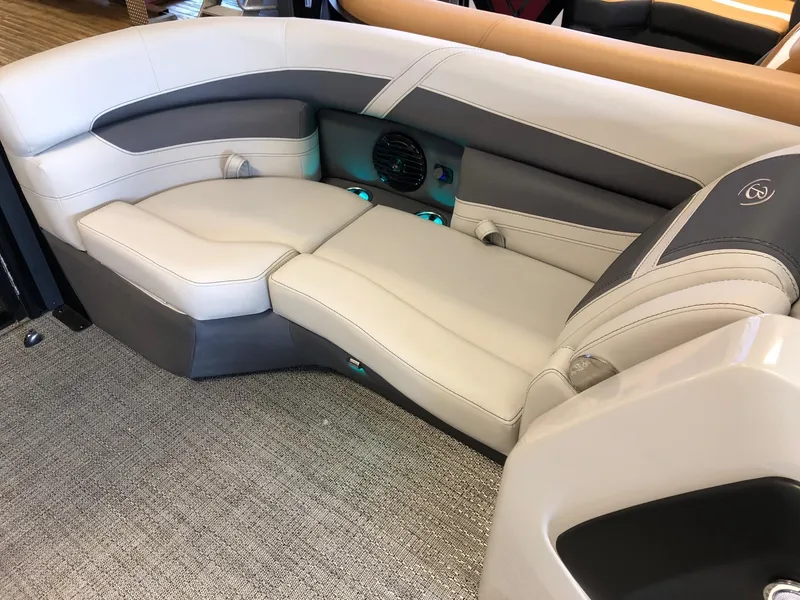 Slide: The Image of 2024 Barletta Cabrio 20Q boat interior seating with premium upholstery. - 10