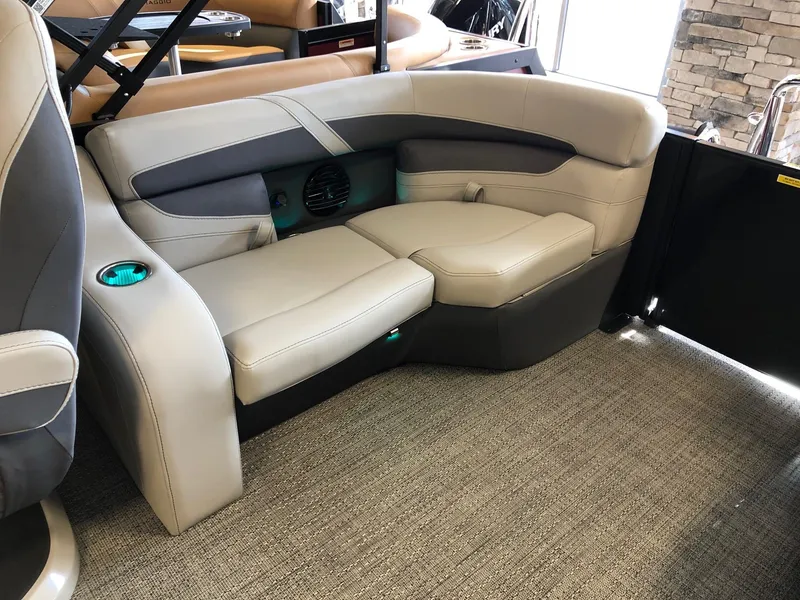 Slide: The Image of 2024 Barletta Cabrio 20Q boat interior with plush seating and modern design. - 12