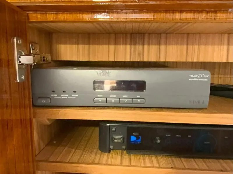 Slide: The Image of Satellite TV receiver and electronic equipment in a 2005 Viking 45 Open Express yacht. - 47