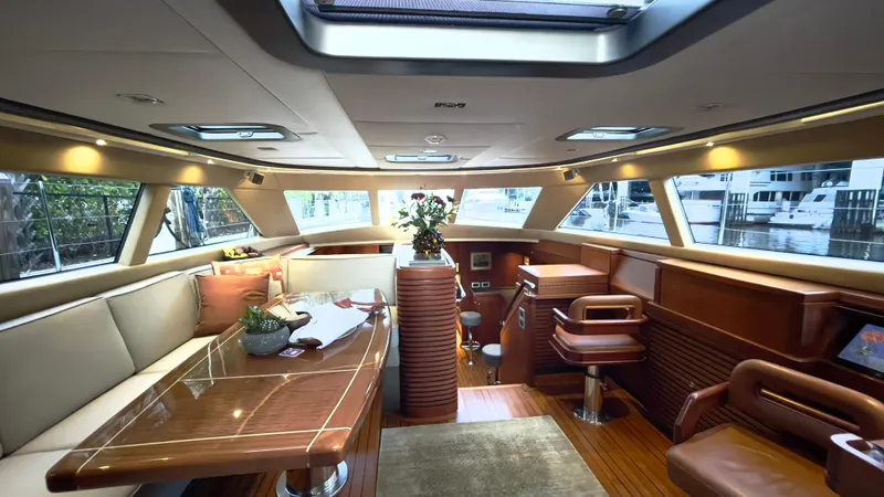 Slide: The Image of Luxurious interior of 2011 Alia Yachts Warwick 82 LK with elegant seating and dining area. - 17