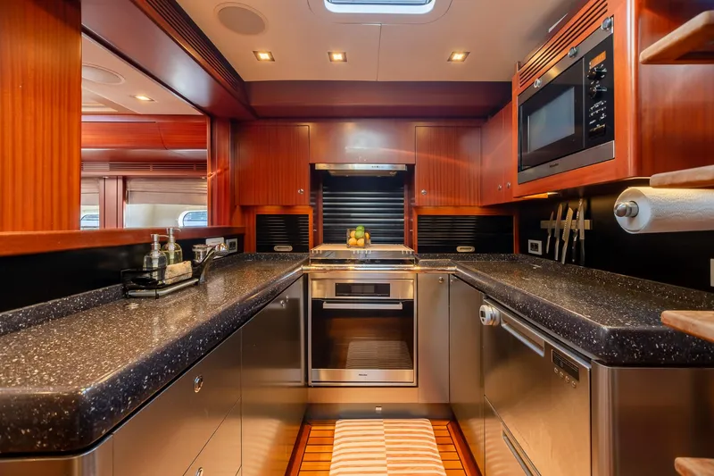 Slide: The Image of Luxurious kitchen in 2011 Alia Yachts Warwick 82 LK with modern appliances and sleek countertops. - 29