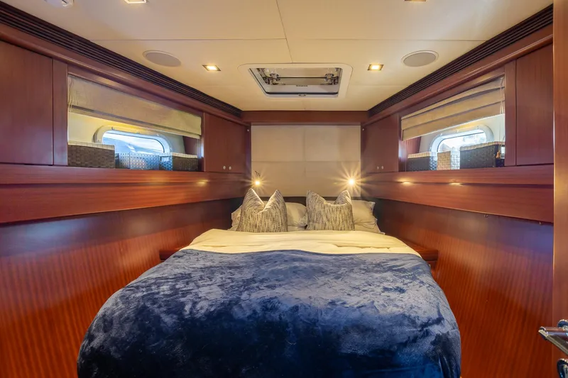 Slide: The Image of Luxurious bedroom on the 2011 Alia Yachts Warwick 82 LK with plush bedding. - 44