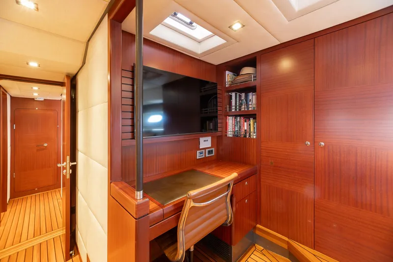 Slide: The Image of Luxurious wooden interior of 2011 Alia Yachts Warwick 82 LK with desk and TV. - 32