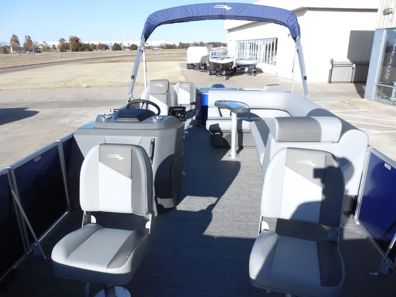 Slide: The Image of 2024 Bennington 20 SVF pontoon boat with spacious seating and modern design. - 4