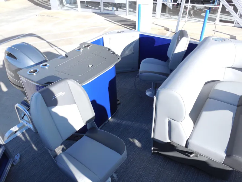 Slide: The Image of 2024 Bennington 20 SVF pontoon boat interior with seating and console. - 7