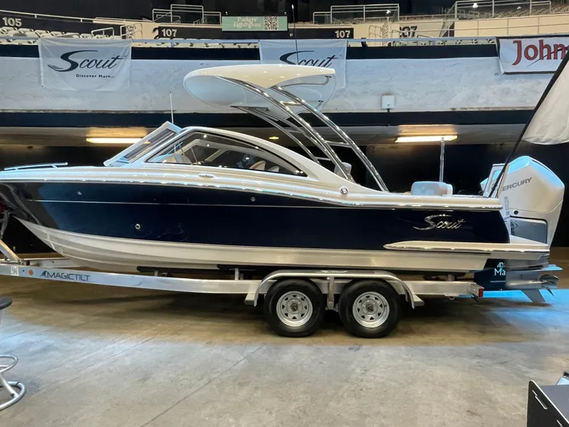The Image of 2024 Scout 240 Dorado boat on trailer in showroom. - 0