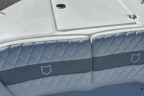Slide: The Image of 2024 Sea Fox 268 Commander boat with quilted seating and storage compartment. - 6