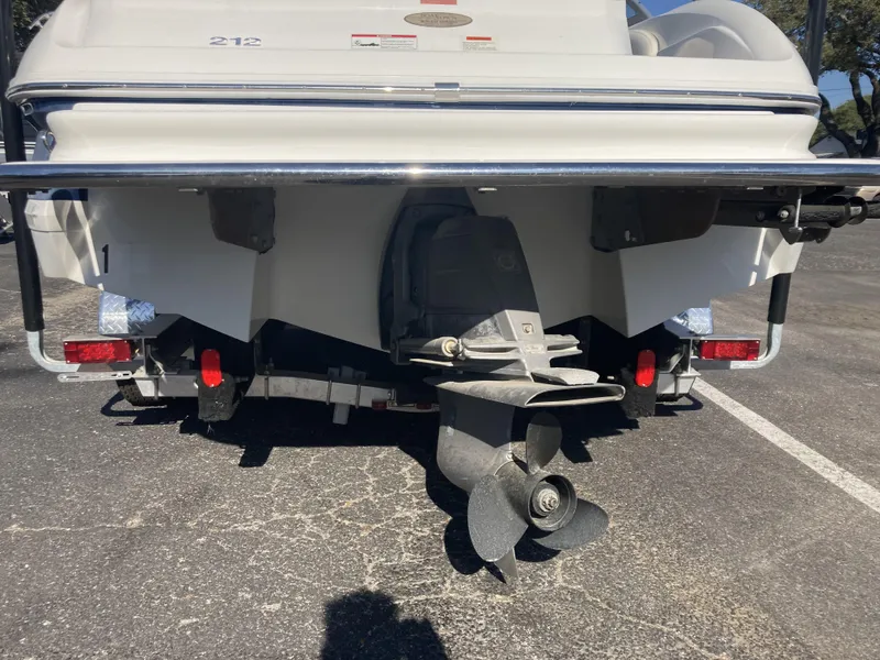 Slide: The Image of Rear view of a 2007 Cobalt 212 boat with propeller and trailer. - 11
