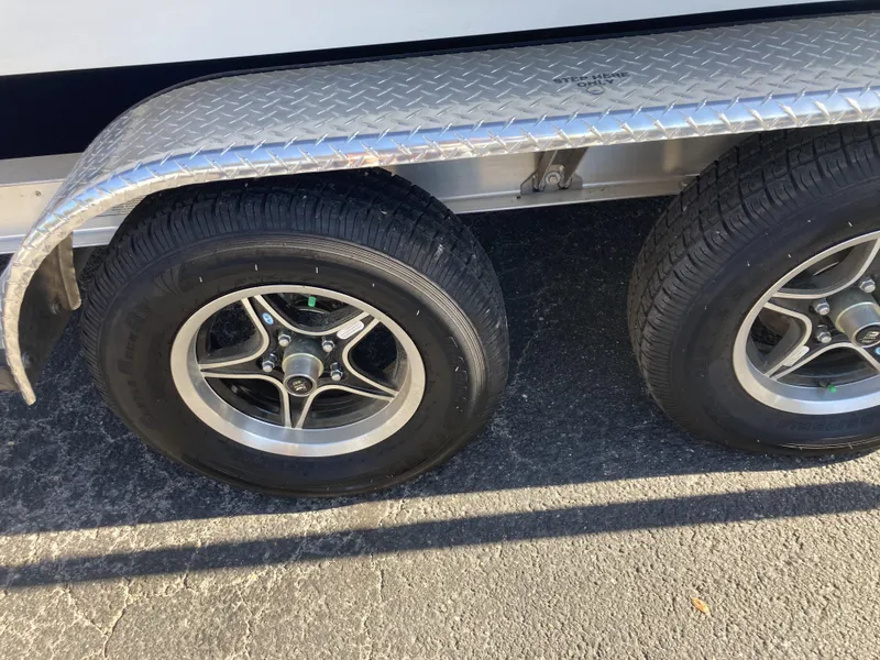 Slide: The Image of Close-up of 2007 Cobalt 212 trailer wheels with diamond plate fender. - 5