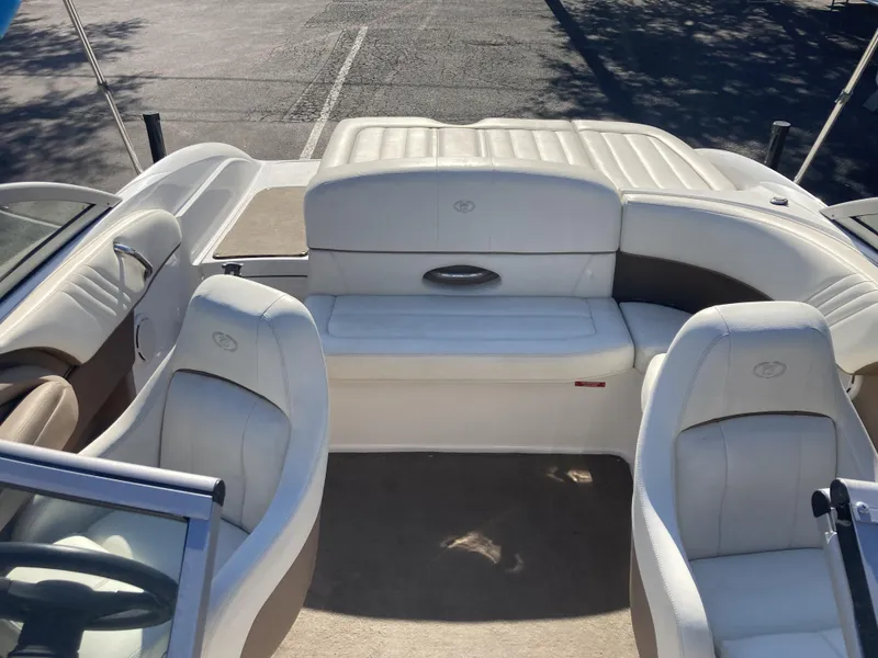 Slide: The Image of Interior of 2007 Cobalt 212 boat with white leather seating. - 7