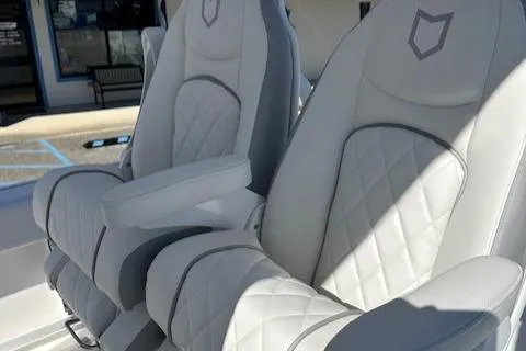 Slide: The Image of Luxurious white seats in 2024 Sea Fox 268 Commander boat. - 10