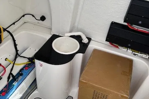 Slide: The Image of 2024 Sea Fox 268 Commander boat interior with wiring and storage compartment. - 14