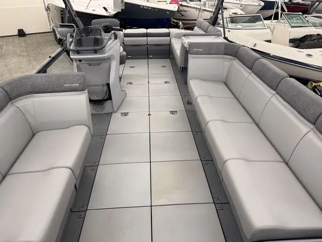 Slide: The Image of Interior of 2023 Sea-Doo Switch Cruise 21 with gray seating. - 6
