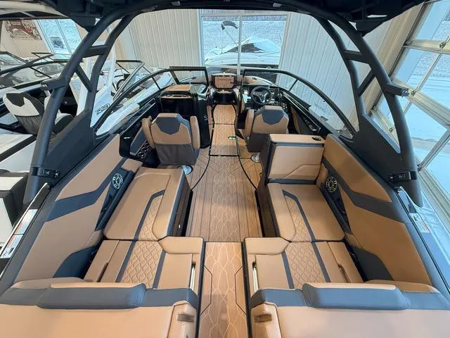 Slide: The Image of 2025 Yamaha Boats 255XD interior with luxurious seating and modern design. - 5