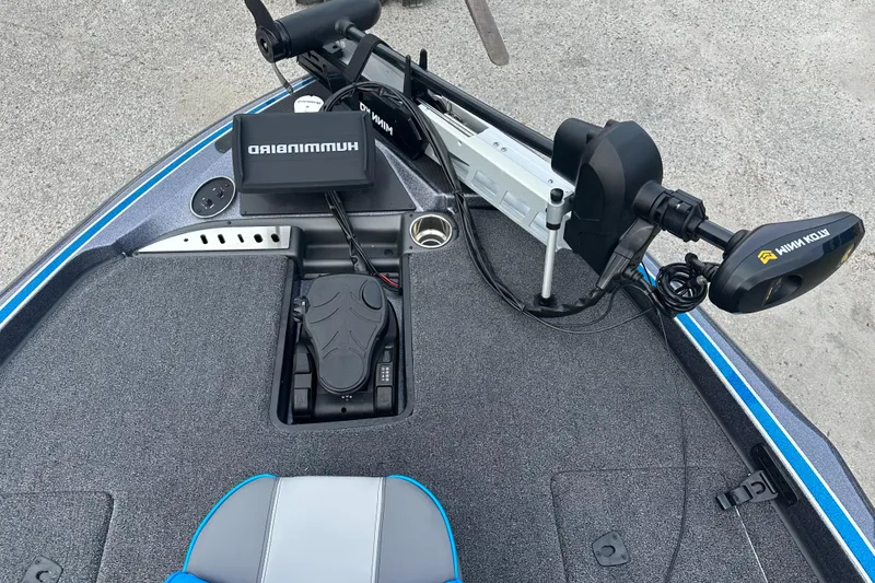 Slide: The Image of 2024 Triton 18 TrX boat with Humminbird electronics and Minn Kota trolling motor. - 9