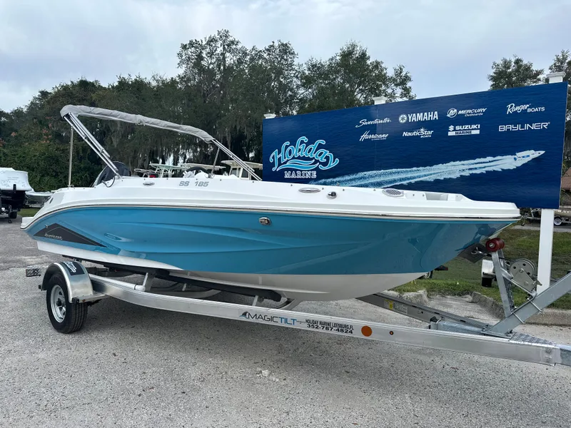 Slide: The Image of 2024 Hurricane SunDeck Sport 185 OB boat on trailer at Holiday Marine. - 1