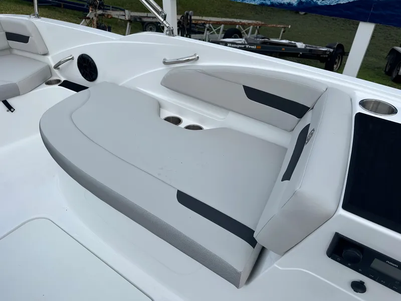 Slide: The Image of 2024 Hurricane SunDeck Sport 185 OB boat interior seating area. - 7