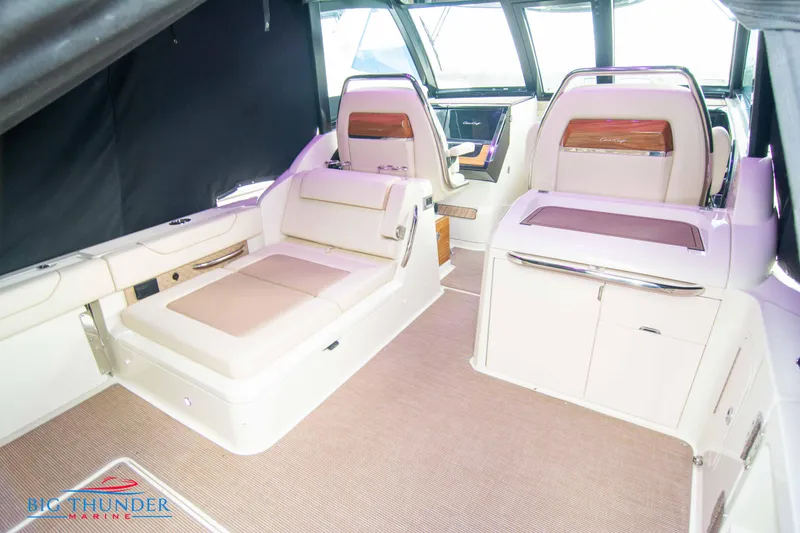 Slide: The Image of Interior of 2024 Chris-Craft CALYPSO 35 CP boat with luxurious seating and modern design. - 18