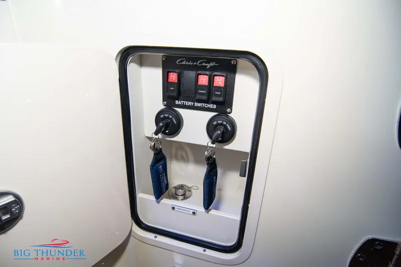 Slide: The Image of 2024 Chris-Craft CALYPSO 35 CP battery switches panel. - 24