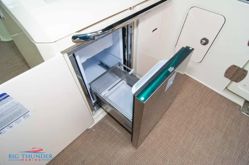 Slide: The Image of Open refrigerator on the 2024 Chris-Craft CALYPSO 35 CP boat. - 27