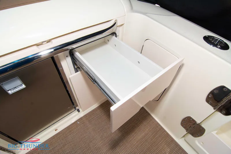 Slide: The Image of Open storage drawer on 2024 Chris-Craft CALYPSO 35 CP boat. - 29