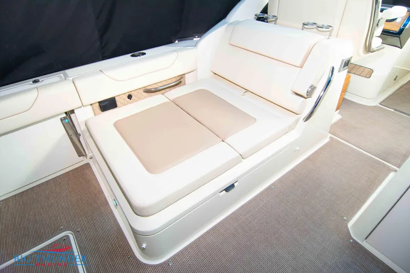 Slide: The Image of 2024 Chris-Craft CALYPSO 35 CP interior seating area with beige upholstery. - 30